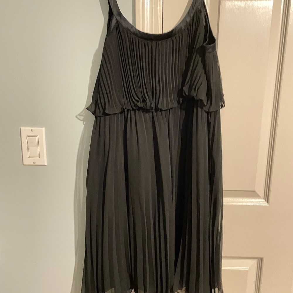 Pleated swing black dress.  Brand new with tags.